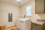 Large laundry room for your convenience.